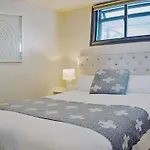 City Fringe Apartment With Sky Tower And City Views
