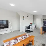 Sleek Vista Townhouse With Deck And Air-Con