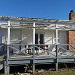 White Weather Board House