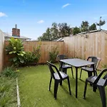 Modern 2-Bedroom Retreat With Private Patio
