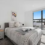 Modern 2-Bedroom Retreat With Private Patio