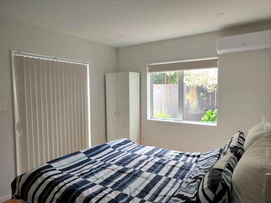 Hospedagem domiciliar Two Bedroom With Private Entrance In Convenient Location