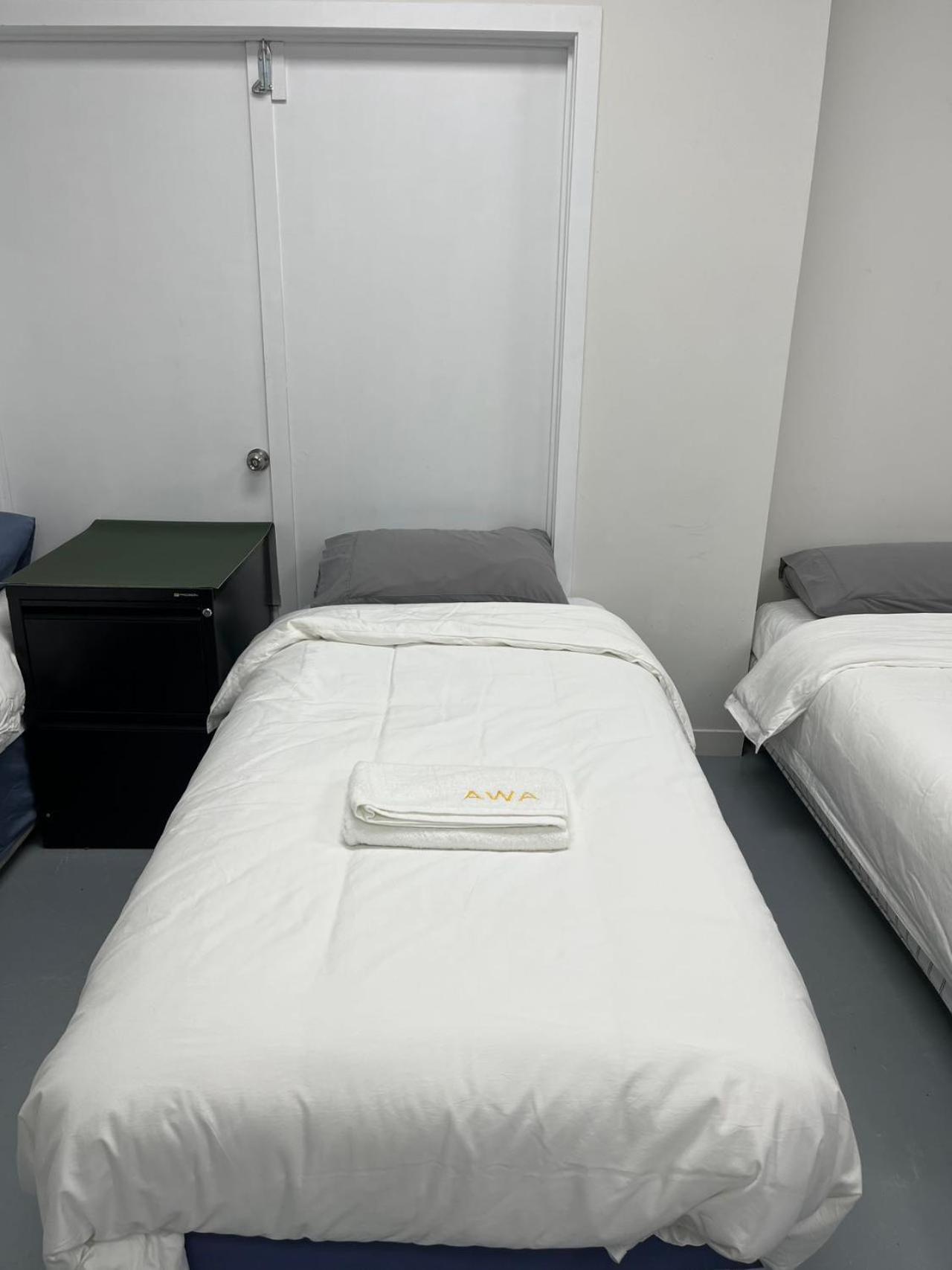 3 Single Bed And 2 Double Sofa Beds Serviced Studio, 7 Apartment Auckland