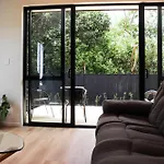 Luxe Modern Large Bedroom With Shared Kitchen And Amenities
