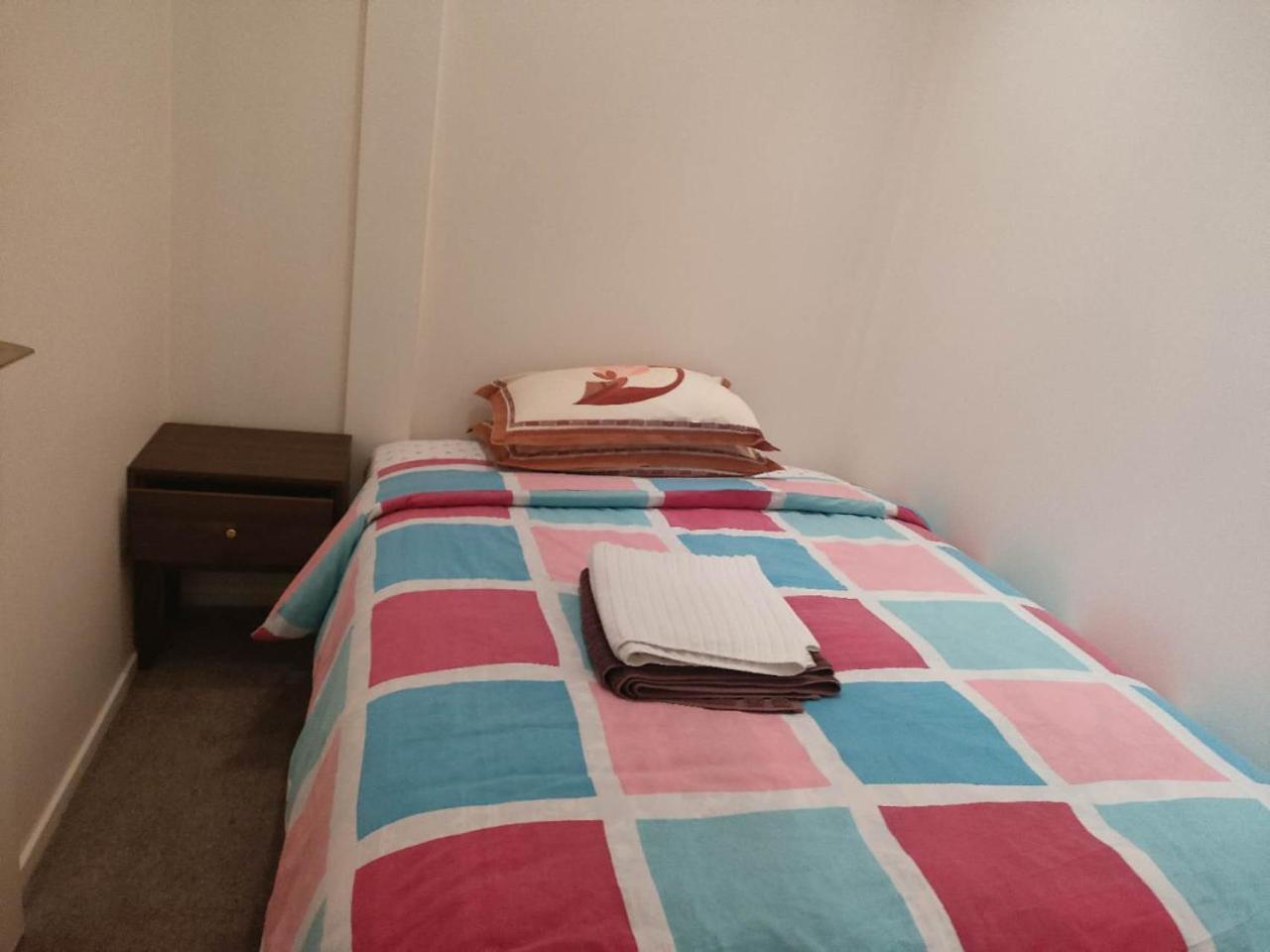3 Double Beds And 1 Single Bed And 2 Double Sofa Beds In A Small 2 Bedrooms Penthouse Auckland
